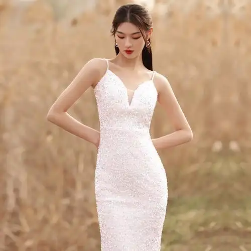 吊带晚礼服裙女轻奢小众高端宴会气质白色性感礼服