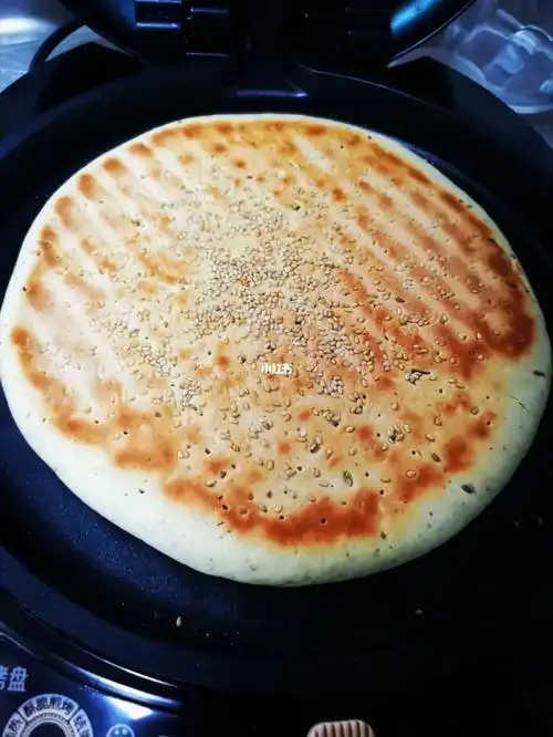 锅盔的做法   还没来的及做配菜,都已经吃了好几块,妈妈的味道