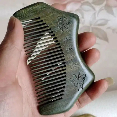 谭木匠官方旗舰同款绿檀木梳子整木料正宗绿檀很香味有柄无柄梳女家用
