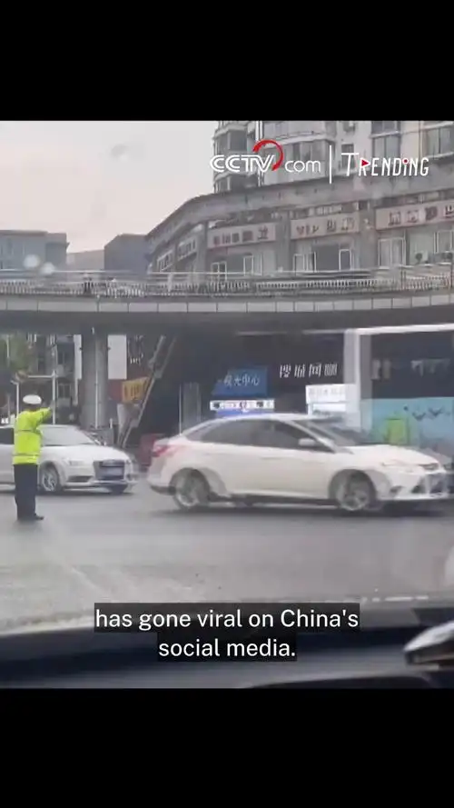 traffic police officer directs traffic with dance moves in china