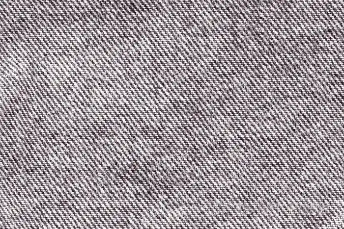 关闭了粗斜纹棉布牛仔裤表面纹理背景