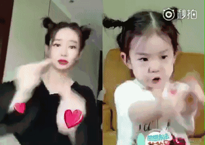 lucky在接受某亲自节目采访时候对着镜头比心的动作,让网友们看的激动