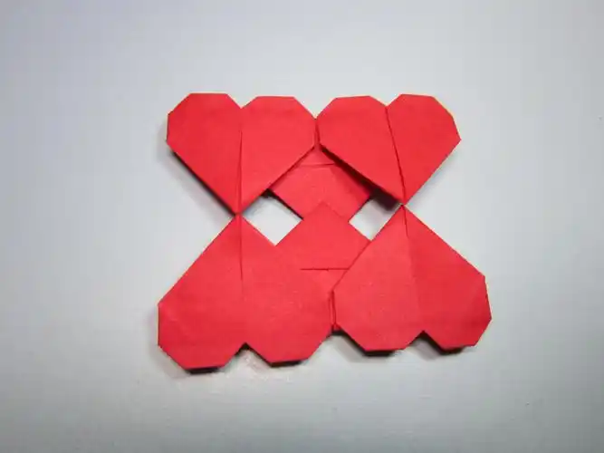 双心折纸方法,手工折纸双爱心,可以用人民币折