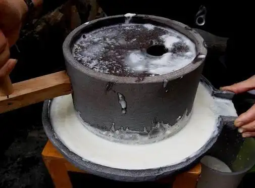 梦见用石磨磨豆浆