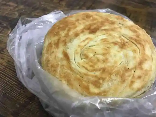 莱芜宫廷烧饼(邻里中心店)-"要离开济南了,临走买了三个烧饼,最普通的