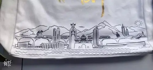 here is 银川"线稿图样以简洁的线条勾勒出贺兰山,黄河水,鼓楼,凤凰碑