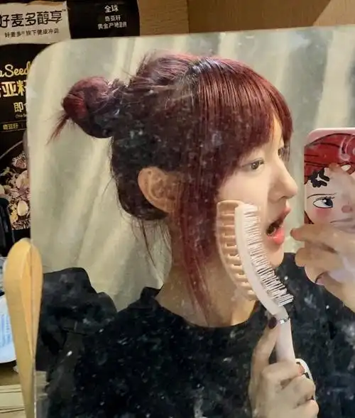 买了把像刷子的梳子