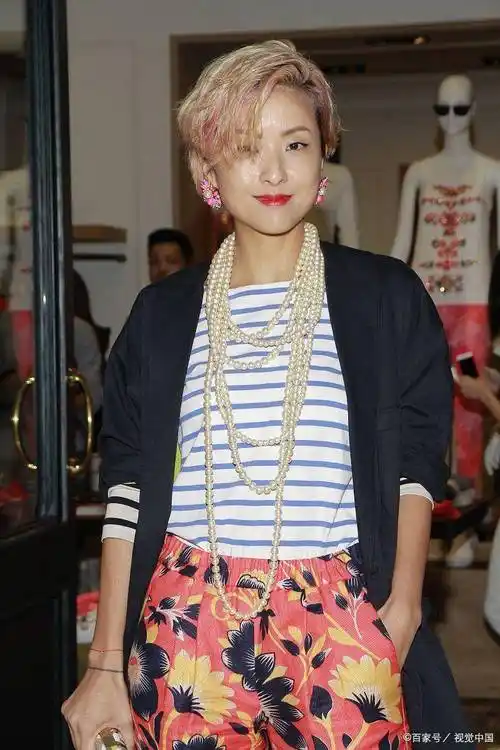 宠妻狂魔陈奕迅:为老婆背三亿房贷,绝境之下走出《孤勇者》_徐濠萦_唐