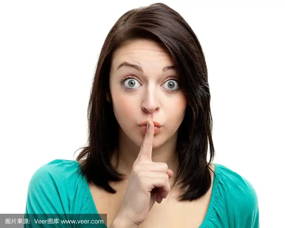 年轻女子安静的手势安静的手势