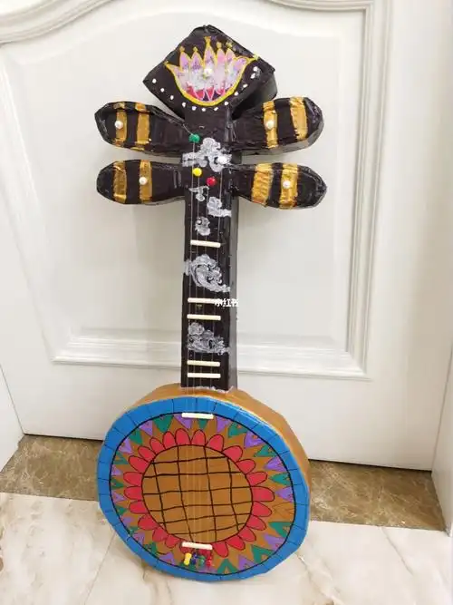 月琴  #手工月琴 #纸箱改造幼儿园音乐90主题,要制作各种乐器,小