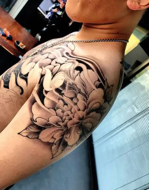 唐狮牡丹花胸纹身图片手臂肩部新传统纹身图案