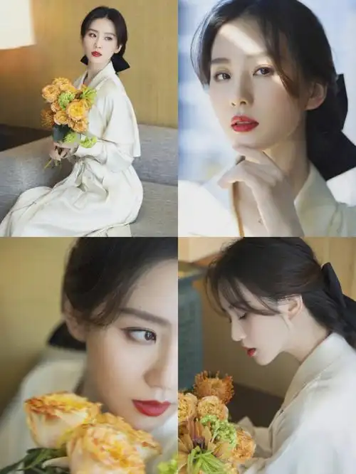 刘诗诗白色风衣搭黑蝴蝶结发带婉约大方