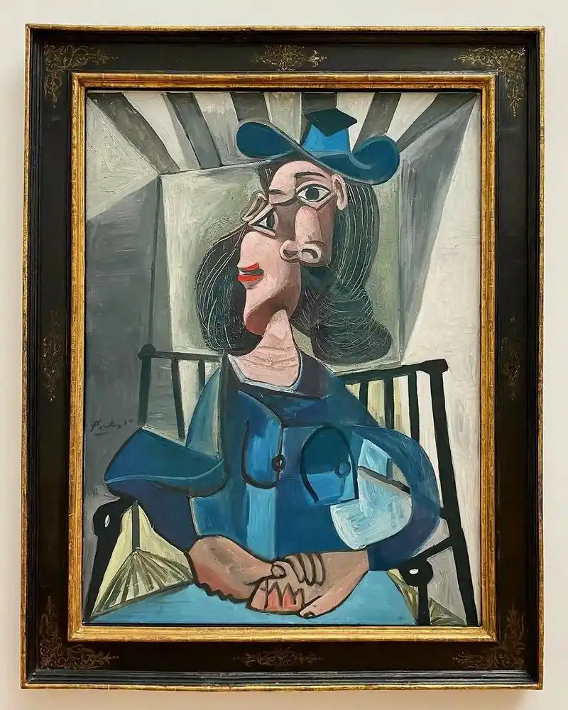 巴勃罗·毕加索,《戴帽子的女人坐在扶手椅上》,1941-42年,油画