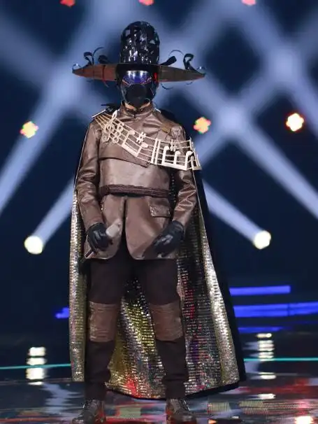 蒙面唱将卡带头发有点乱是谁身份揭晓 女歌手田震变音唱法被猜是陶喆