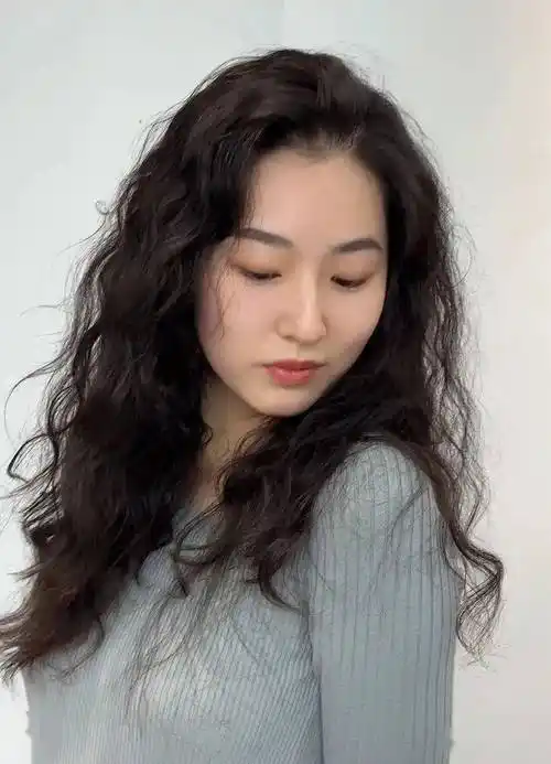 冬至后流行"烫满头"