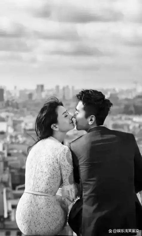 高圆圆勾着老公脖子隔着口罩与赵又廷亲吻女儿司空见惯般淡定