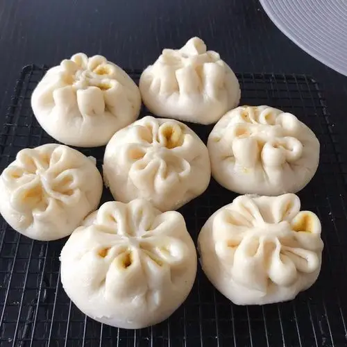 心悦_做的花形包子做法视频(咖喱肉包)