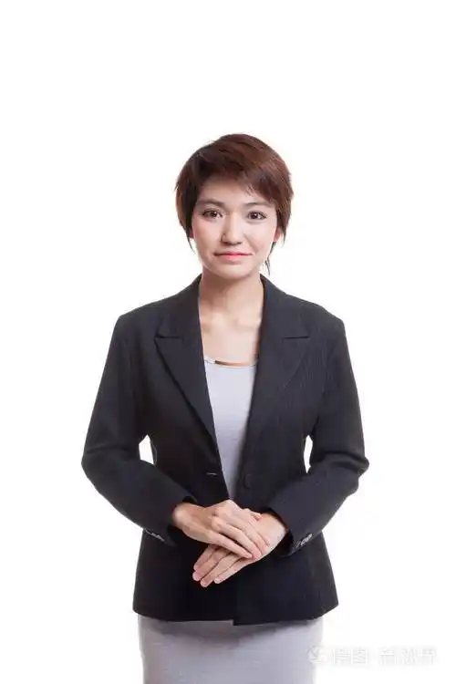 年轻的亚洲业务女人穿西装照片-正版商用图片1qzixg-摄图新视界