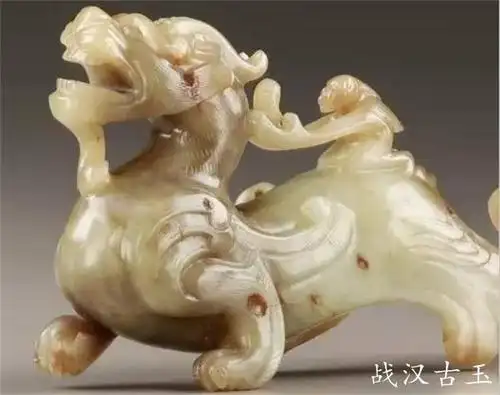 顶级战汉古玉赏析——东汉羽人驭神兽