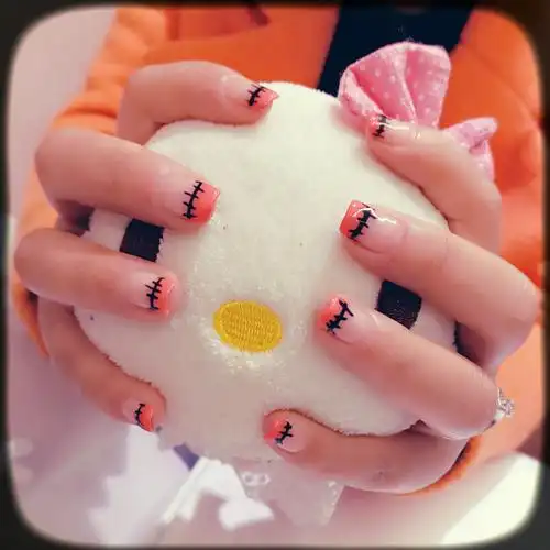 美甲 彩绘 卡通 橘色