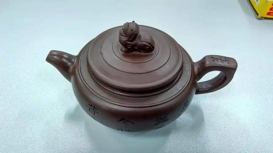 手头有一把徐汉棠 紫砂壶 求鉴定