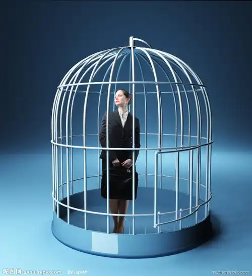 关在鸟笼子里面的商务人物图片