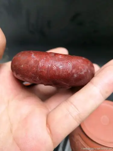 良渚时期老红玉挂件手件个个满身工艺