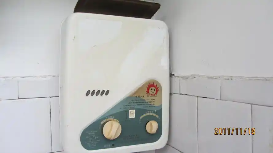 燃气热水器水温低, 我家的热水器是老式的小太阳热水器 用了10来年了