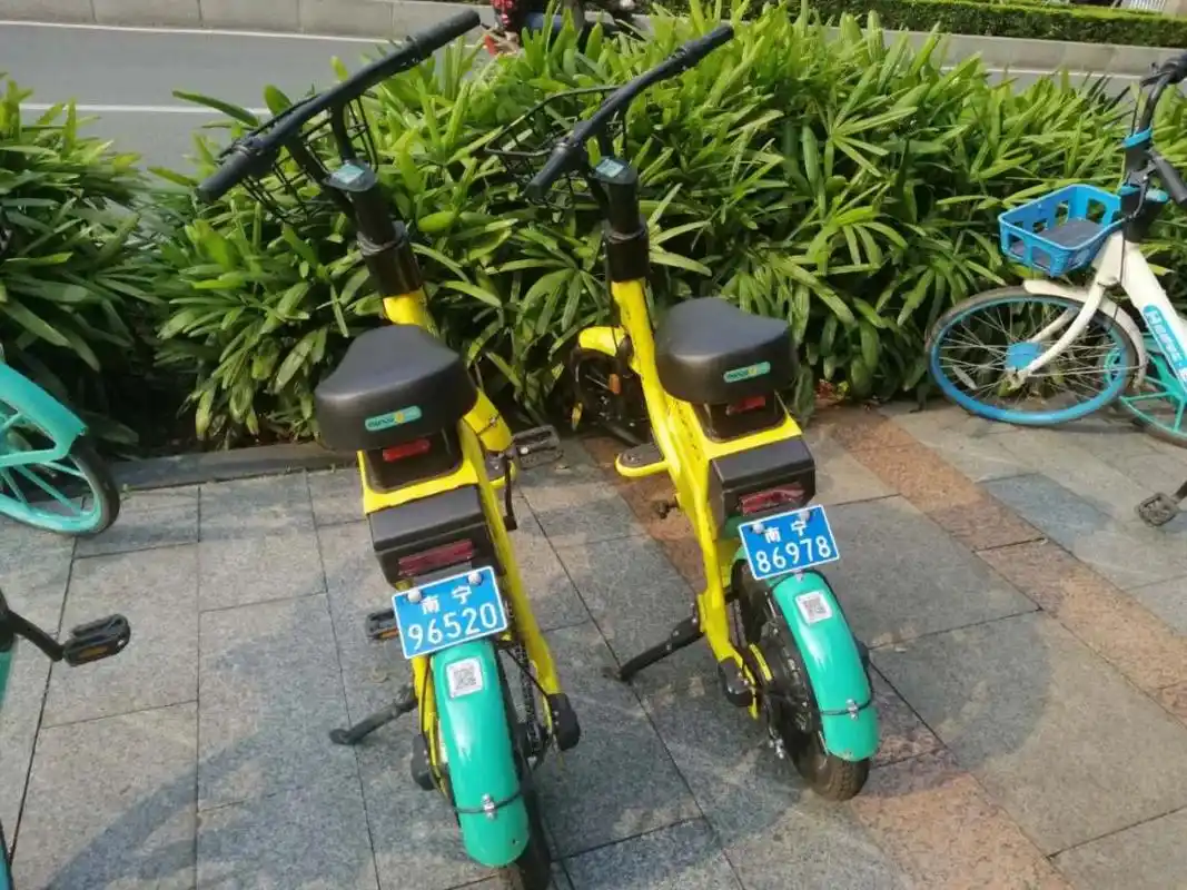 南宁街头出现首批上牌共享电动车租借的时候认准这个