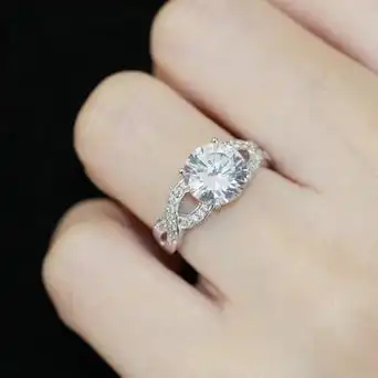 太阳云高档精致微镶交叉气质仿真一克拉钻戒女款百搭求婚戒指礼物