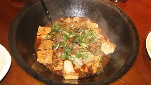 铁锅炒菜会帮人补铁吗?