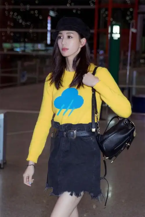 张钧甯甜美活力机场照图片