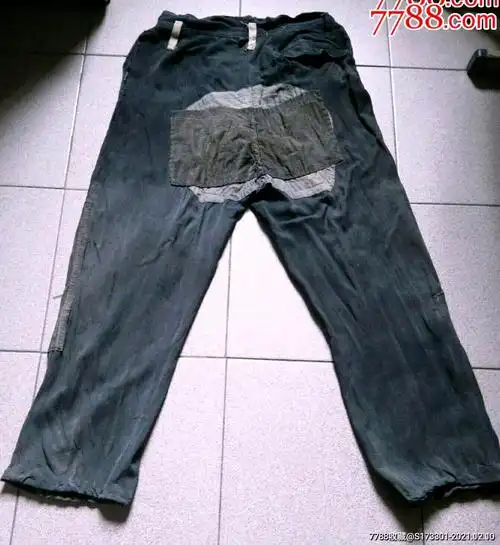 老裤子破烂褪色补丁盖补丁