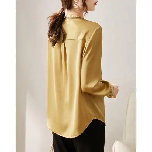 沫晗依美香槟色上衣2021年秋季新款时尚气质百搭民族风衬衫