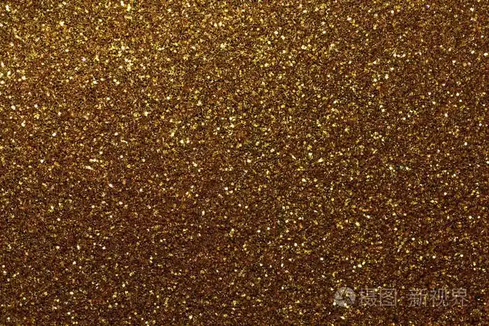暗金闪闪发光的背景从小亮片特写. 来自纺织品的明亮闪亮的背景.