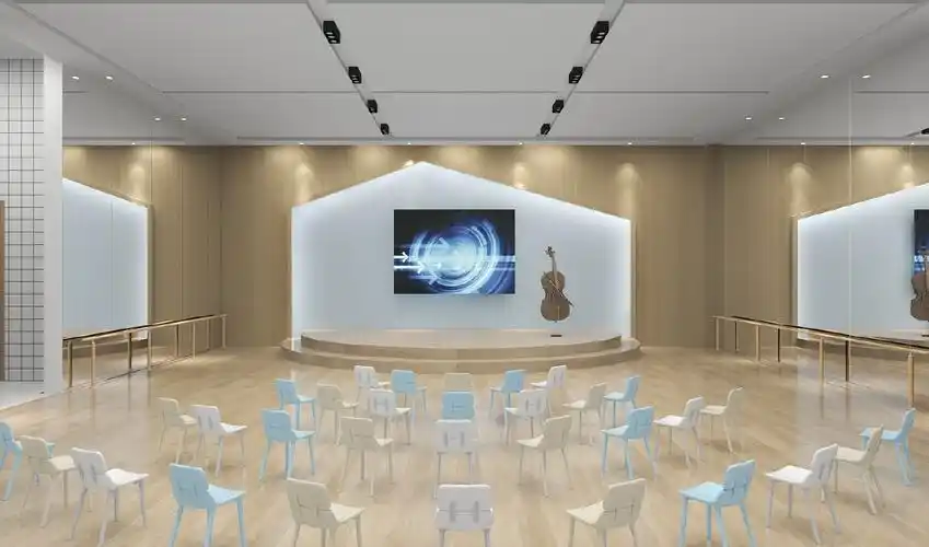 这个房间是一个舞蹈教室,教室中间有一块圆形的木质舞台,上面放着一块