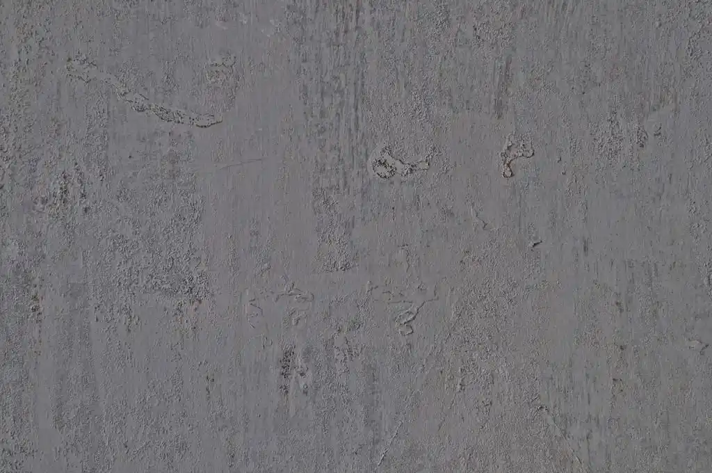 铁灰色背景,关门的灰色粗金属表面纹理