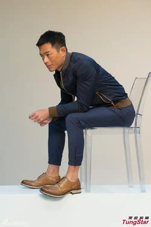 组图:古天乐写真化身黑武士 想创造英雄角色