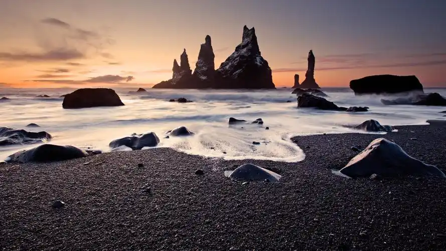 风景海滩夕阳落日大海礁石4k专区壁纸