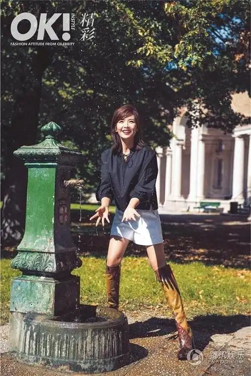 刘涛——黑色宗秀短衬衫,搭配白色短裤,以及一身设计感强烈的长靴
