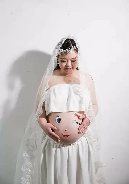 14楼 你的肚子好小哦,我的32周都这么大了.