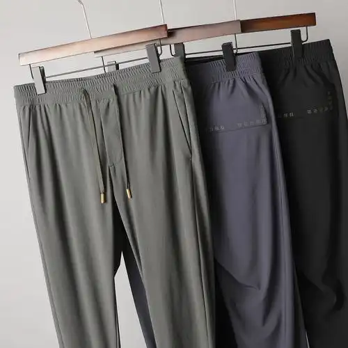 薄滑弹冰丝质感夏季男裤子高弹力修身免烫松紧腰抽绳压胶休闲裤男