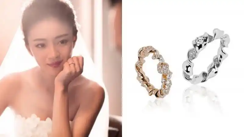 是陈荣炼将密封香槟瓶口用的铁丝圈旋成一枚戒指向安以轩求婚,非常有