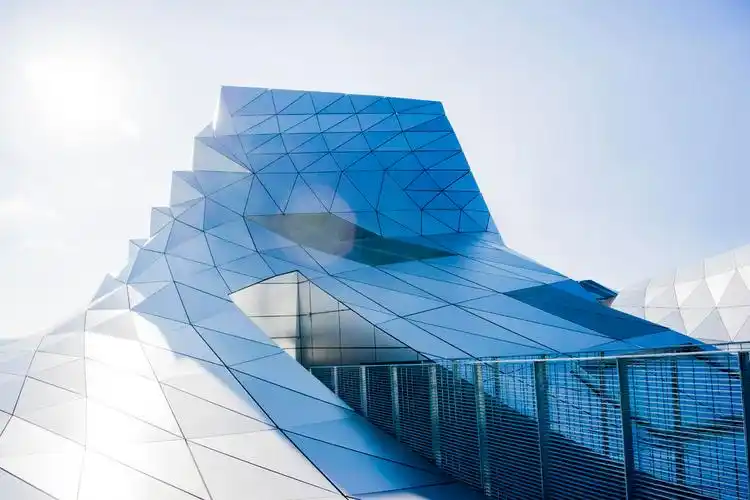 蓝色建筑学建筑设计未来玻璃建筑物背景图片