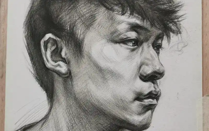 素描揉擦男青年侧面