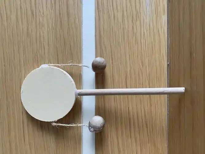 看,我们的拨浪鼓制作成功啦!