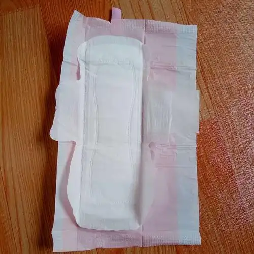 日用棉面亲肤干爽型245mm 卫生巾少女专用学生姨妈巾100片 散装 包邮