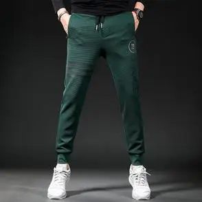 秋冬厚款休闲裤秋季小脚裤潮流新款高端轻奢男士绿色运动裤男修身
