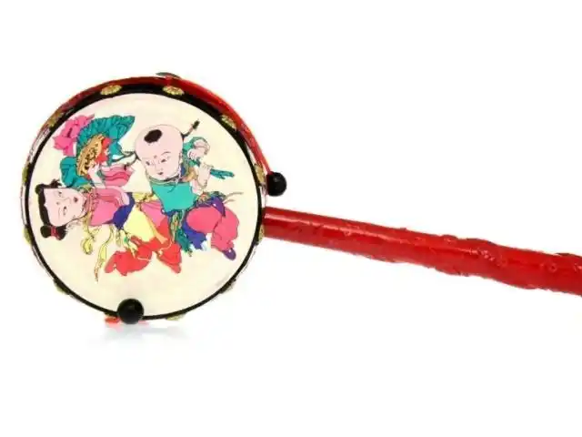 拨浪鼓是老北京四合院卖货郎的老物件儿也是中国传统玩具之一