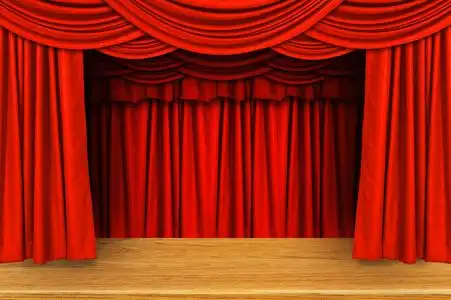 红色的窗帘和木制舞台地板照片